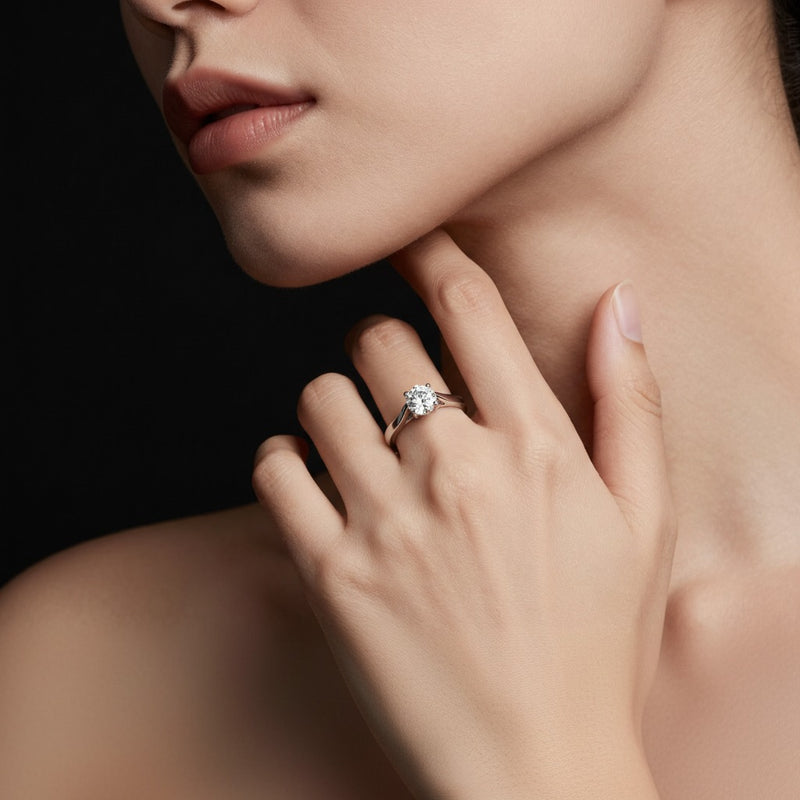 Model wearing round accented solitaire fancy engagement ring