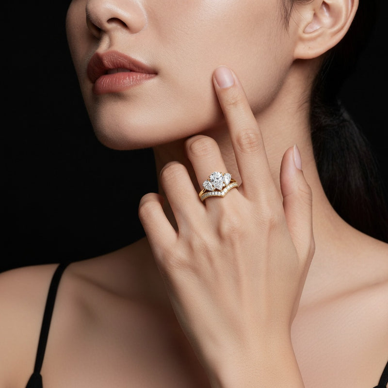 Model wearing pear insert jacket ring