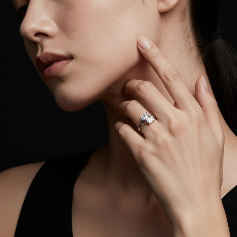 Model wearing emerald toi et moi fashiion ring