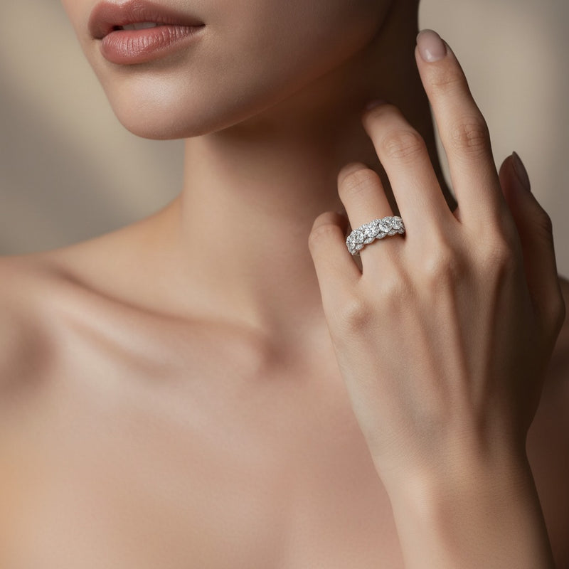 Model wearing round multi stone band ring