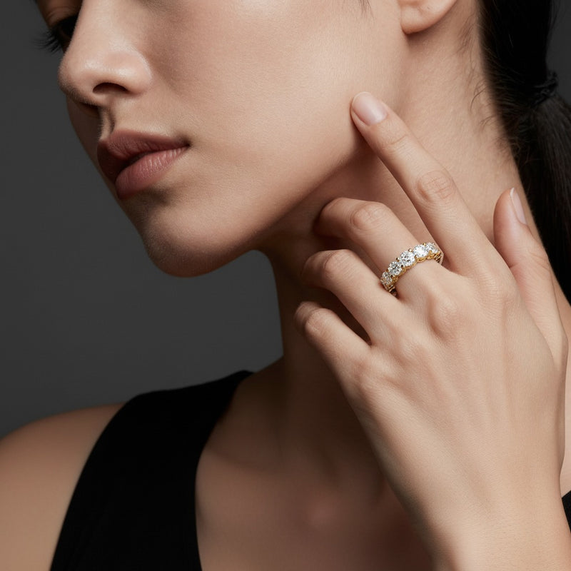 Model wearing round eternity band ring