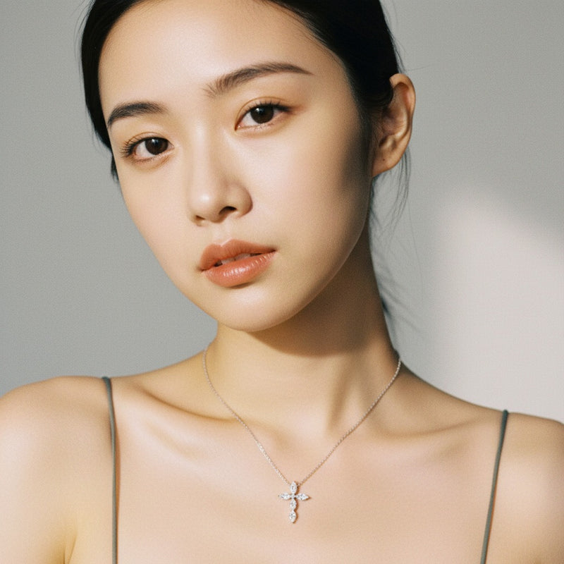 Model wearing marquise cross pendant