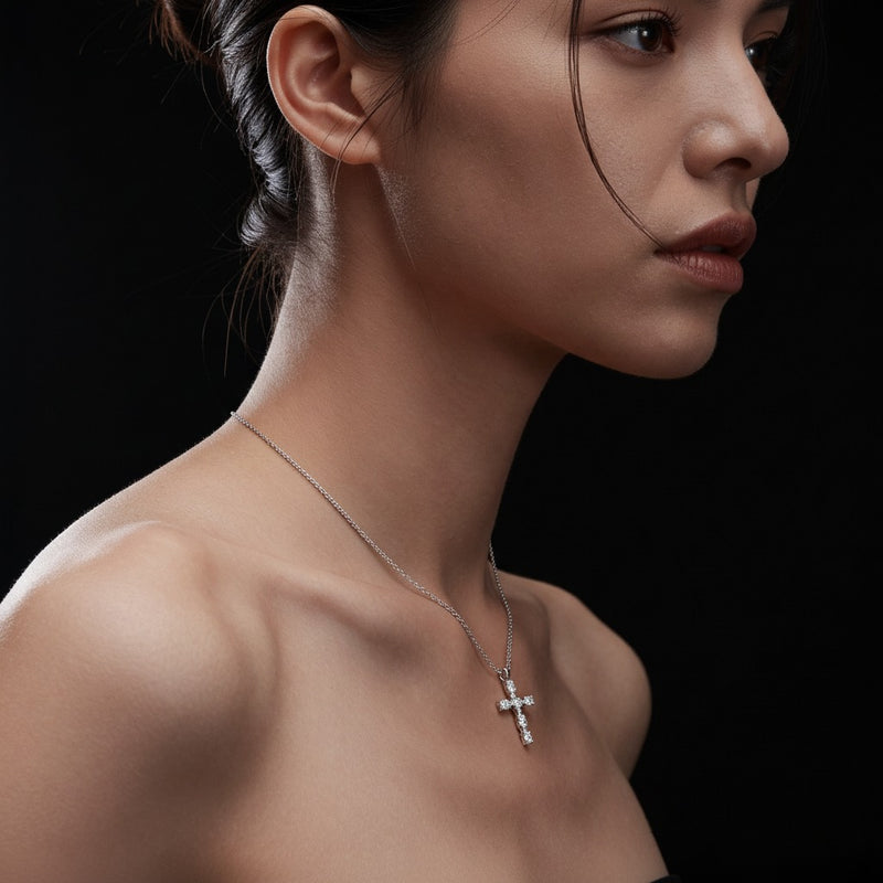 Model wearing oval cross pendant