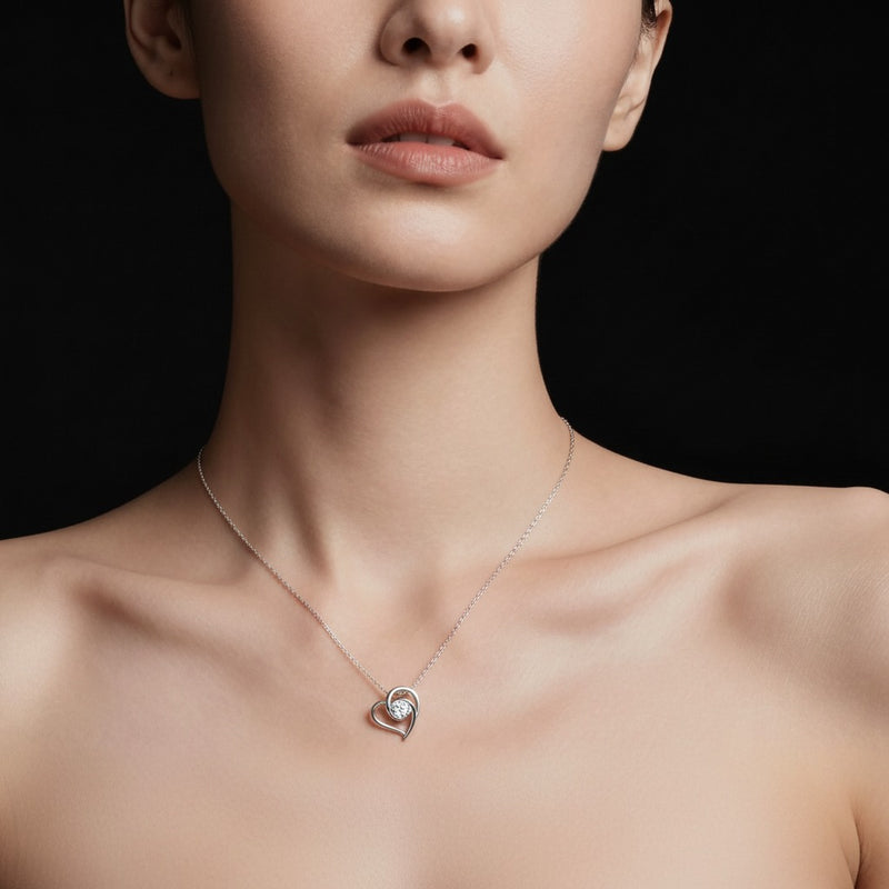 Model wearing heart pendant