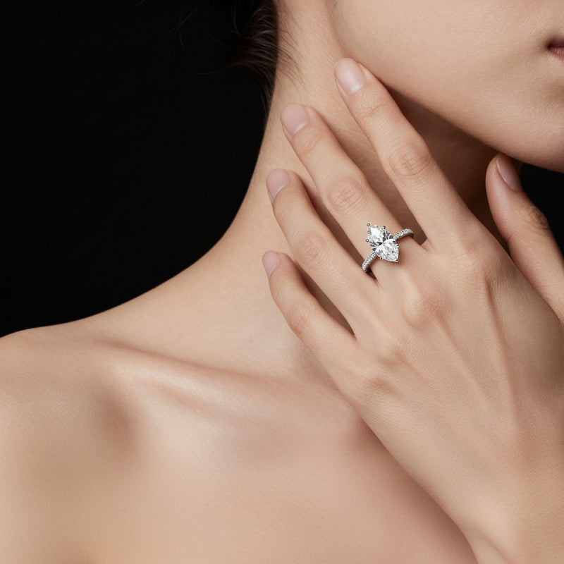 Model wearing marquise east west accented ring