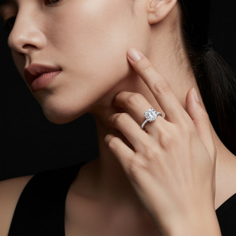Model wearing oval east west accented ring