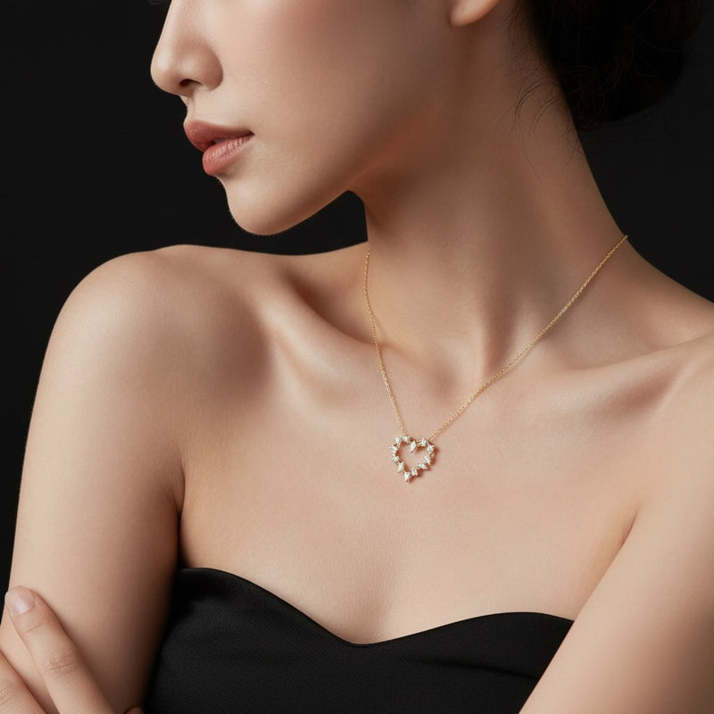 Model wearing heart pendant