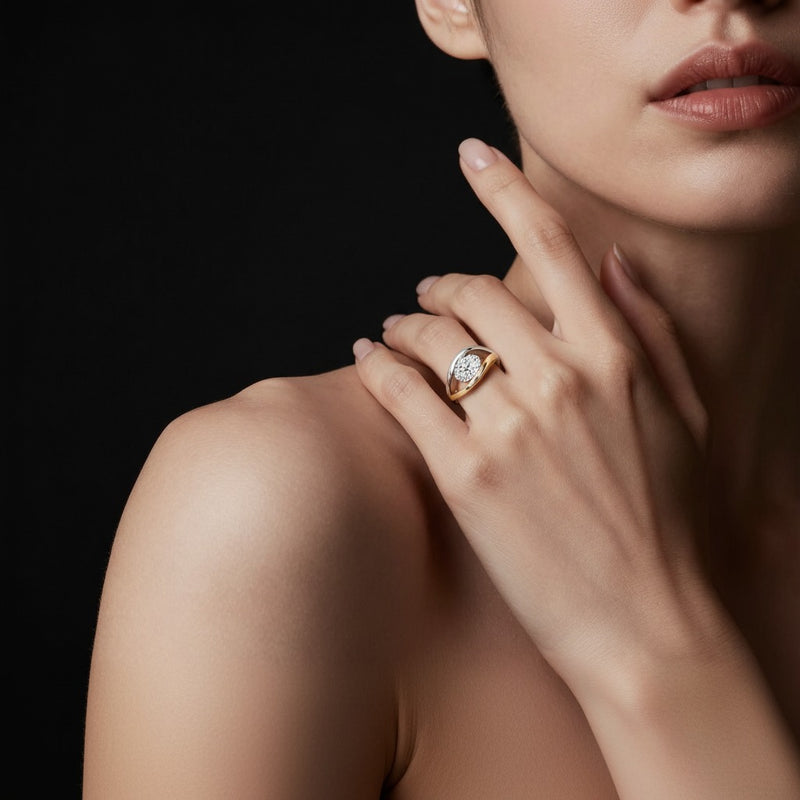Model wearing oval east west solitaire ring