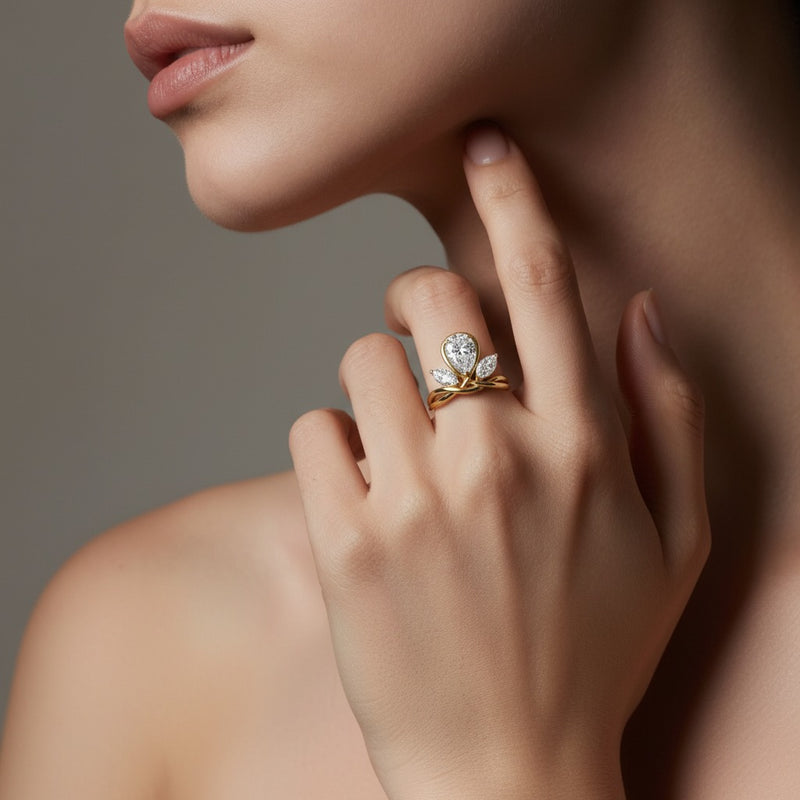 Model wearing pear knot ring