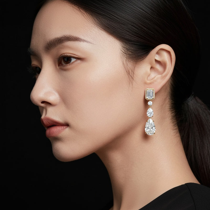 Model wearing radiant dangle earrings