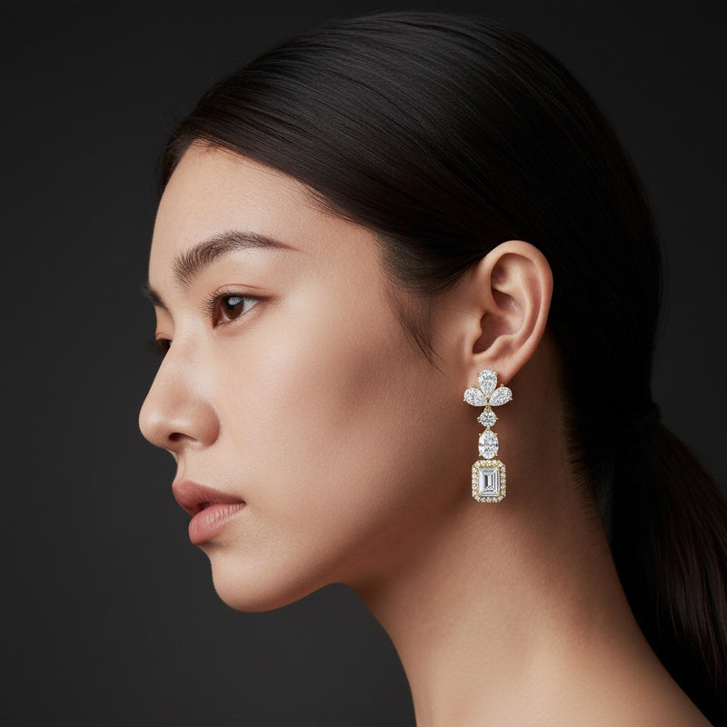 Model wearing radiant dangle earrings