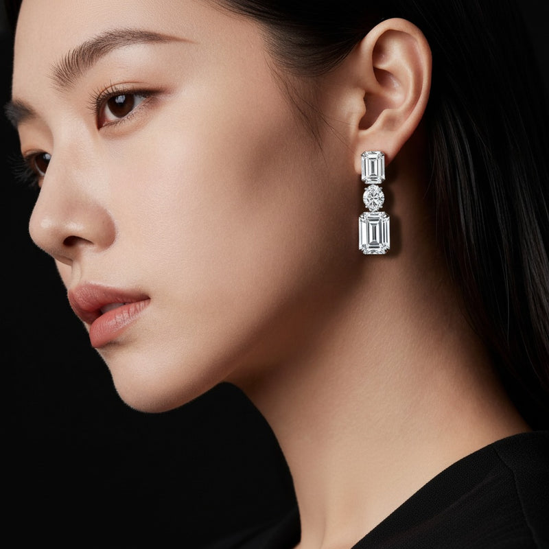 Model wearing radiant dangle earrings