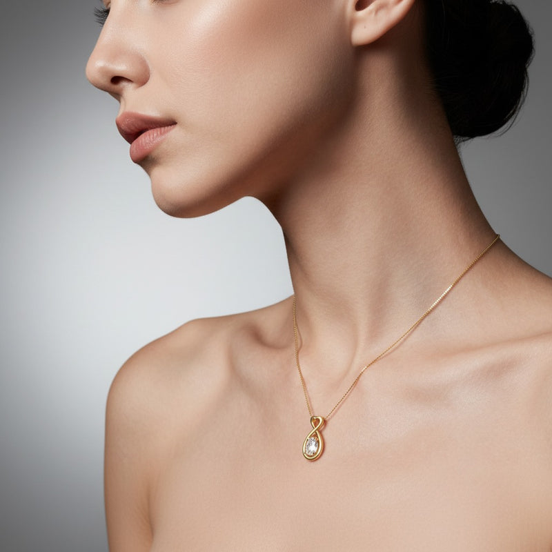 Model wearing oval fancy solitaire pendant