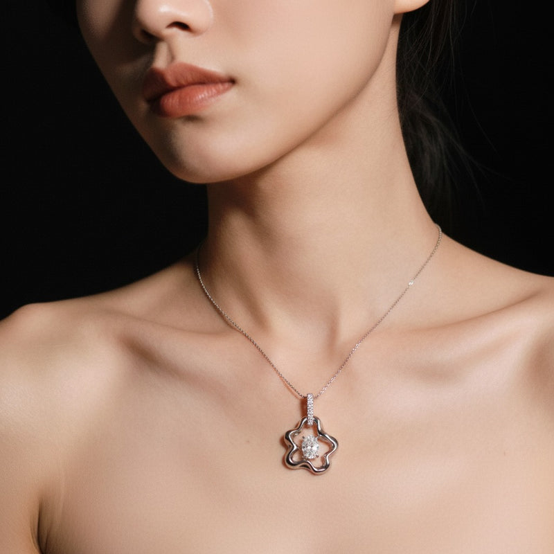 Model wearing oval organic design solitaire pendant