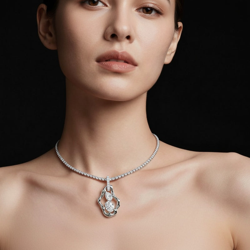 Model wearing oval organic design solitaire pendant