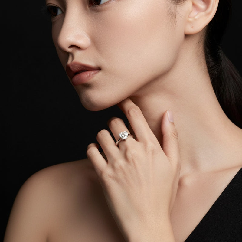 Model wearing heart ring