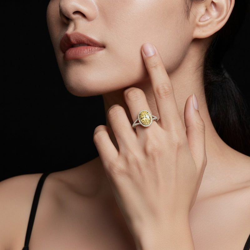 Model wearing oval bold accented statement engagement ring