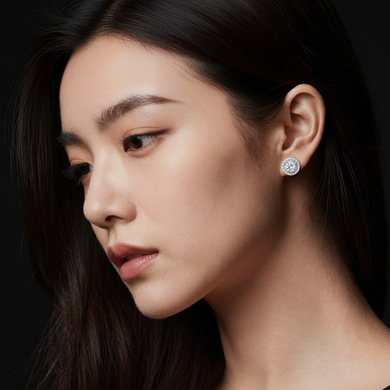 Model wearing round stud earrings