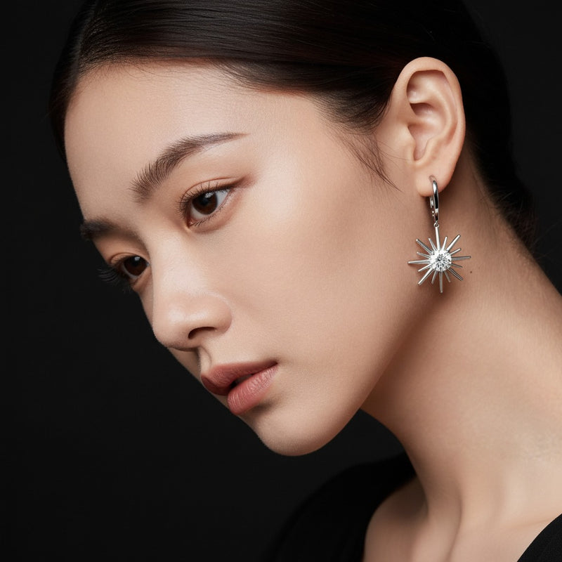 Model wearing round astralis earrings