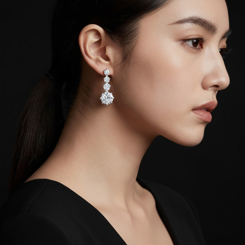 Model wearing round antique design earrings