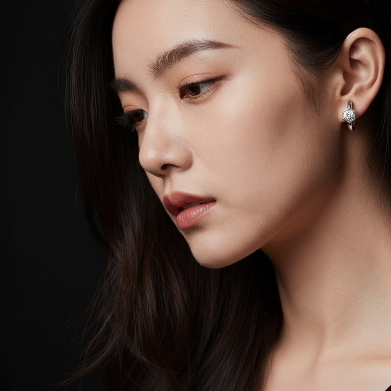 Model wearing round hoop earrings