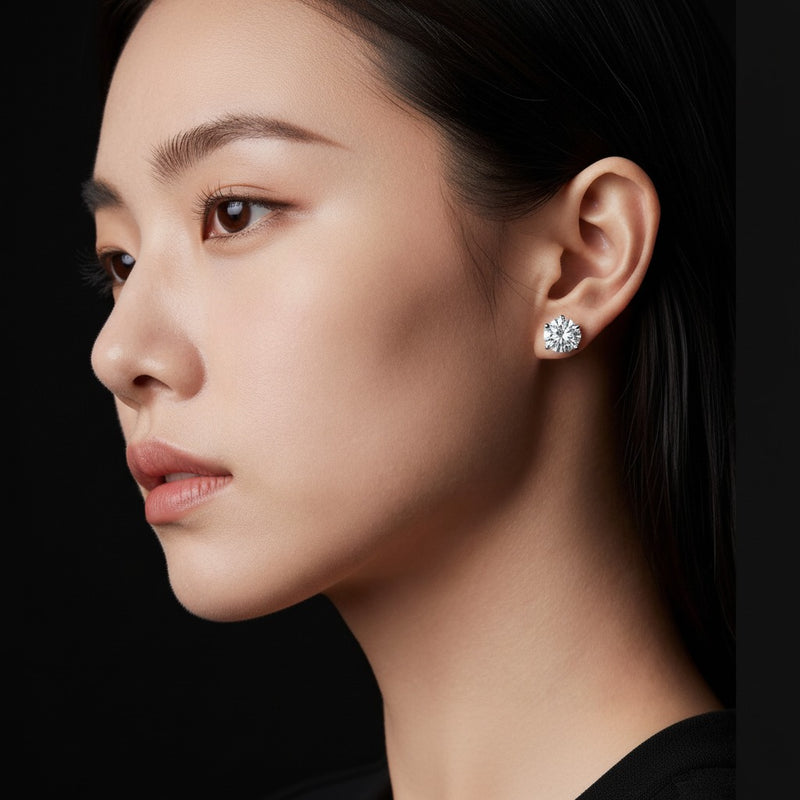 Model wearing round three prong martini stud earrings