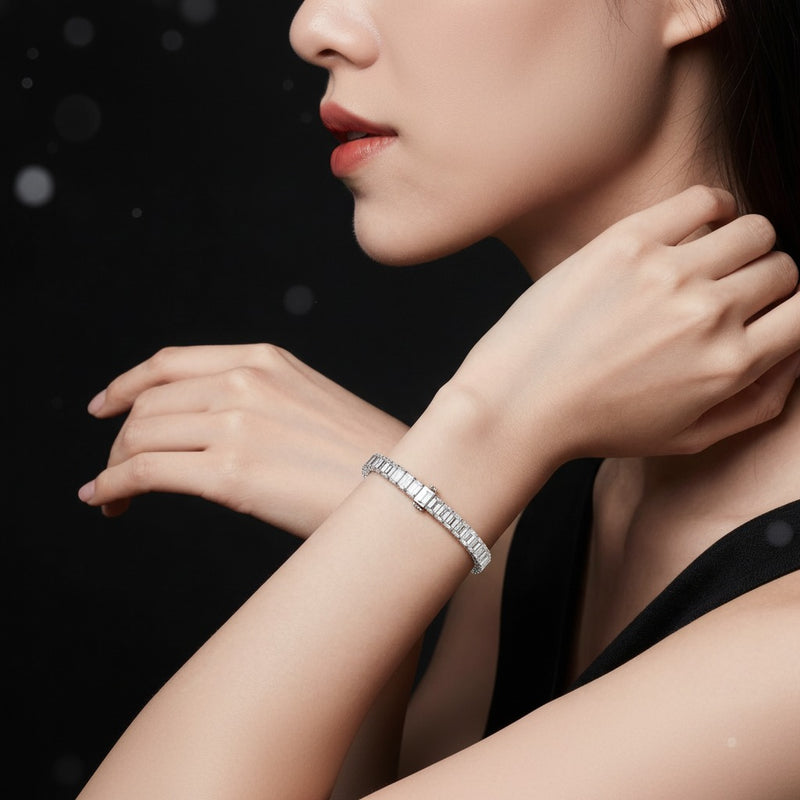 Model wearing emerald bracelet