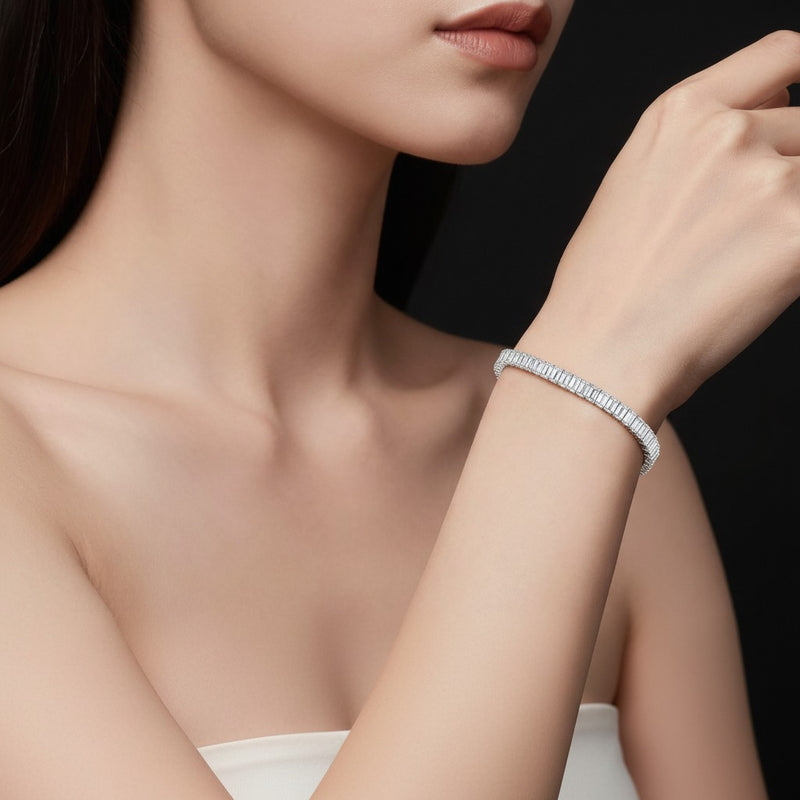 Model wearing emerald lab grown diamond north south bracelet