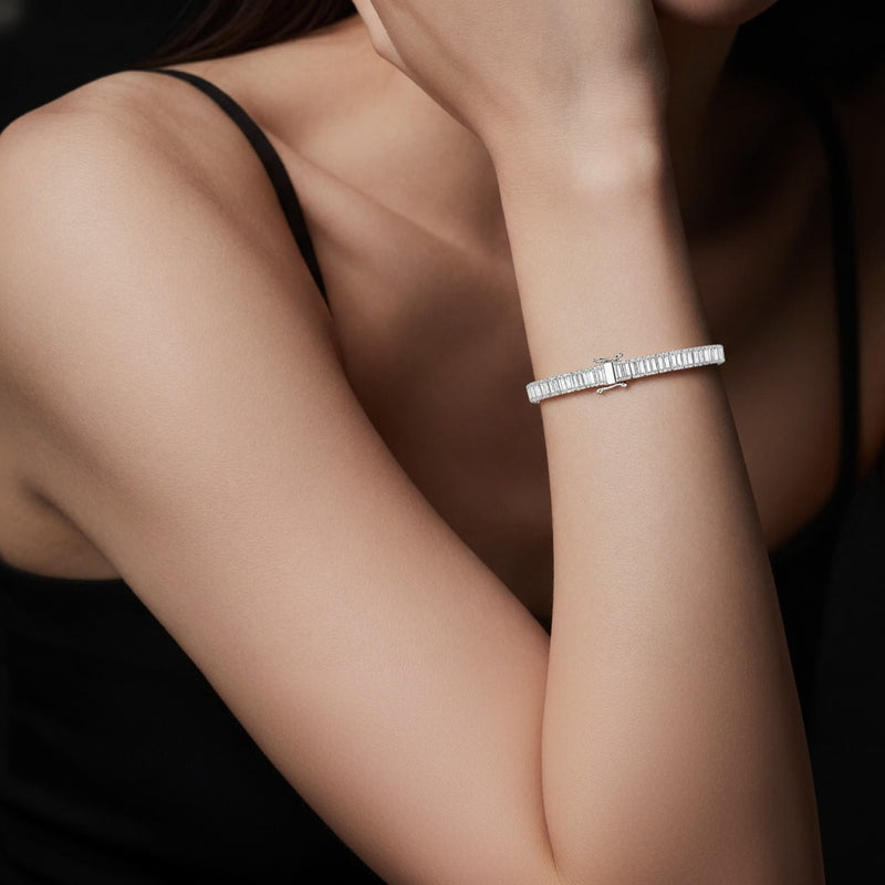 Model wearing emerald lab grown diamond north south bracelet