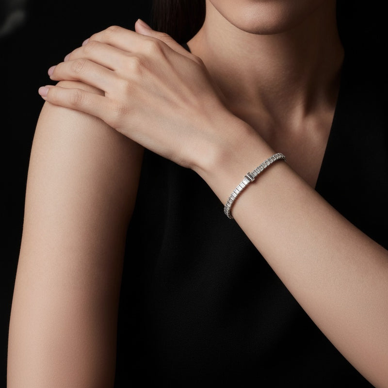 Model wearing emerald lab grown diamond north south bracelet