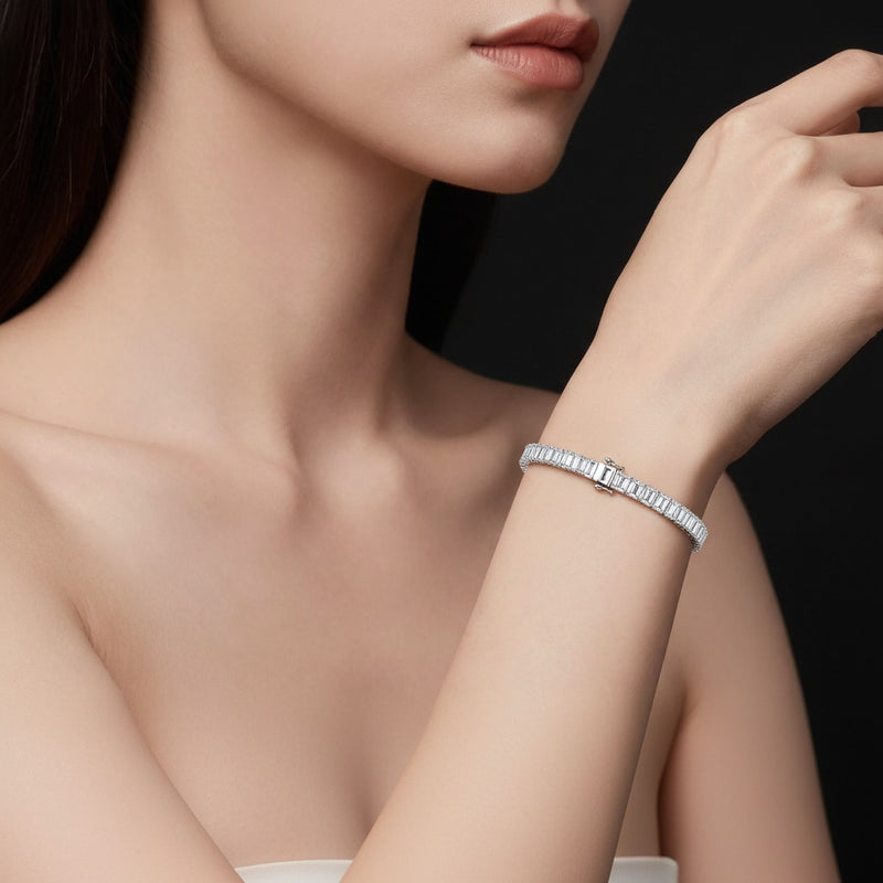 Model wearing emerald lab grown diamond north south bracelet