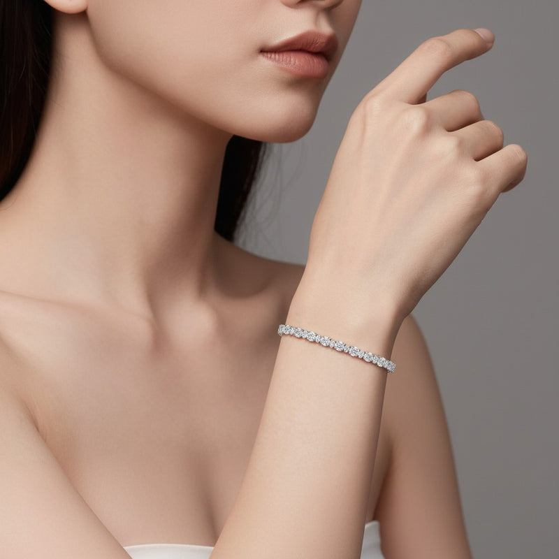 Model wearing oval lab grown diamond north south bracelet