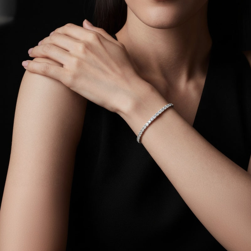 Model wearing round lab grown diamond tennis bracelet