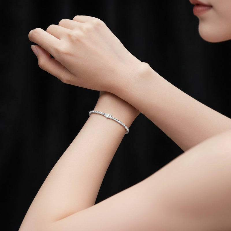 Model wearing round lab grown diamond tennis bracelet