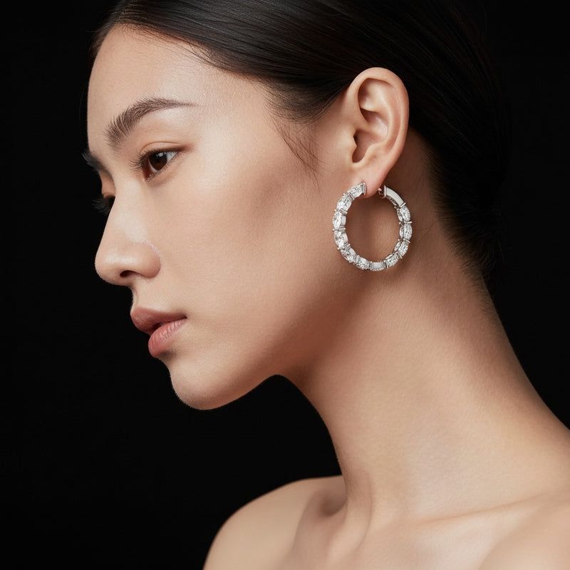 Model wearing oval lab grown diamond inside out hoop earrings