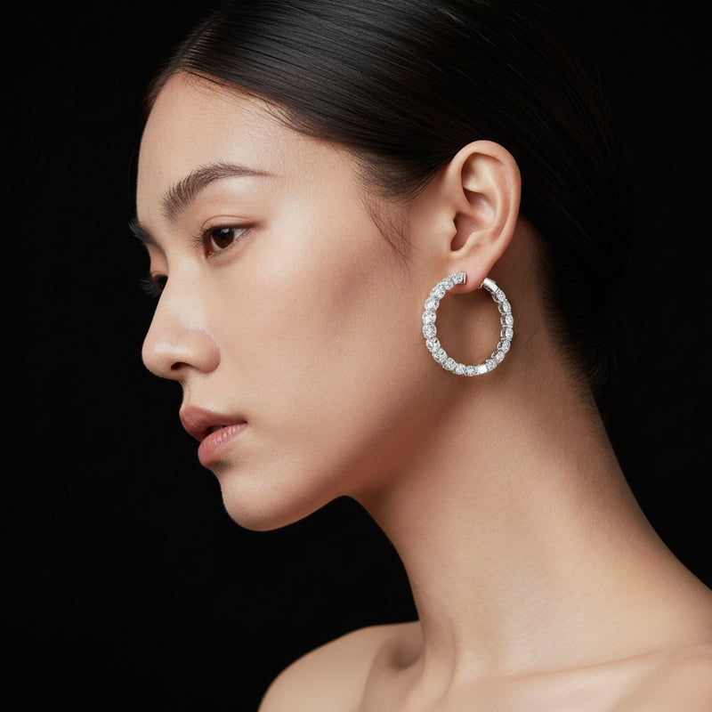 Model wearing round lab grown diamond inside out hoop earrings
