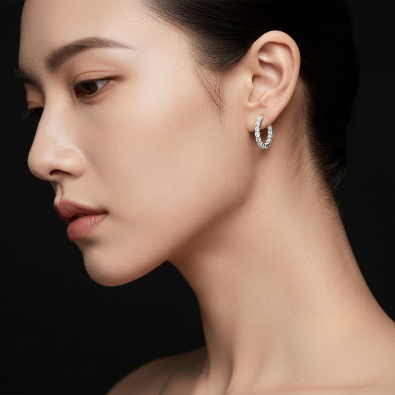 Model wearing round lab grown diamond inside out hoop earrings
