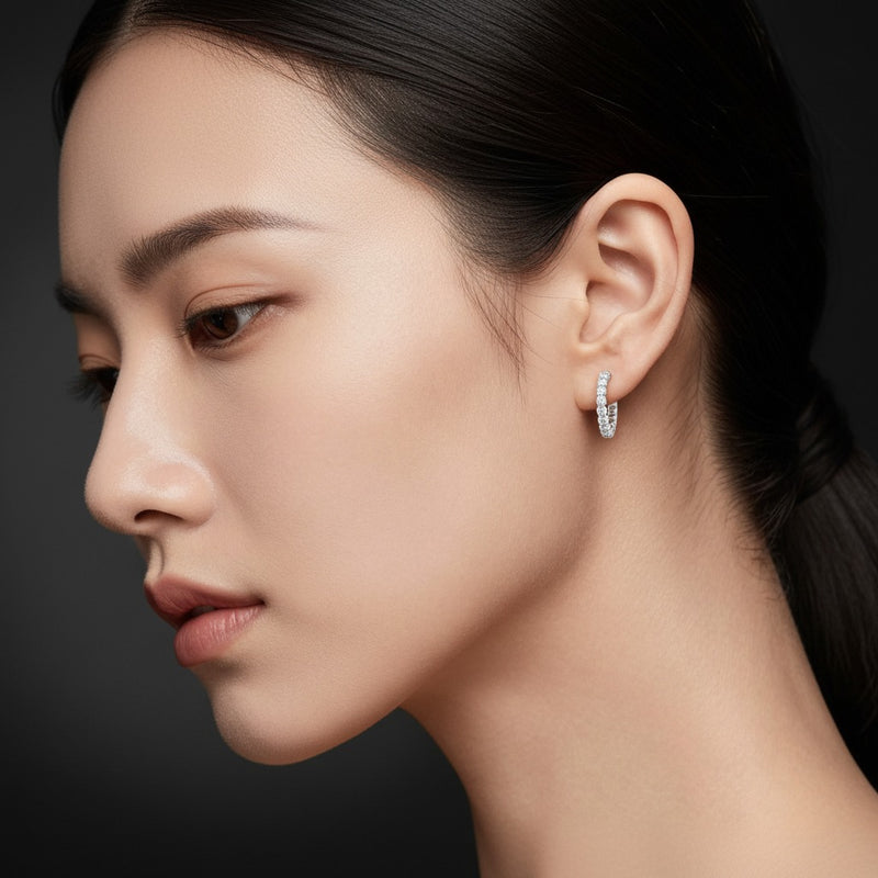 Model wearing round lab grown diamond inside out hoop earrings
