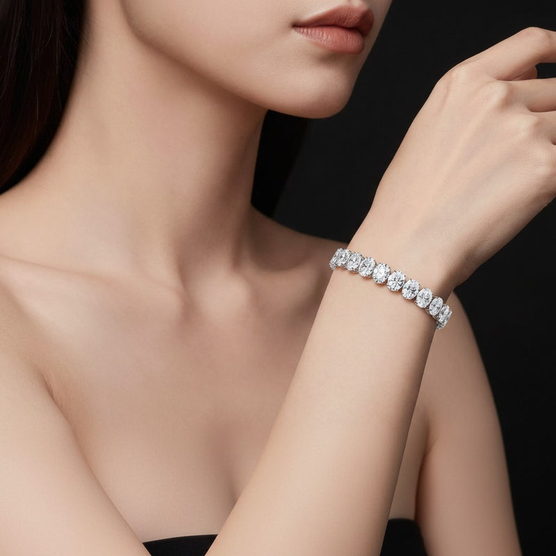 Model wearing oval lab grown diamond east west bracelet