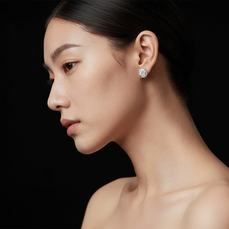 Model wearing round stud earrings