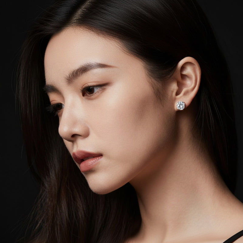 Model wearing round lab grown diamond 4 prong stud earrings