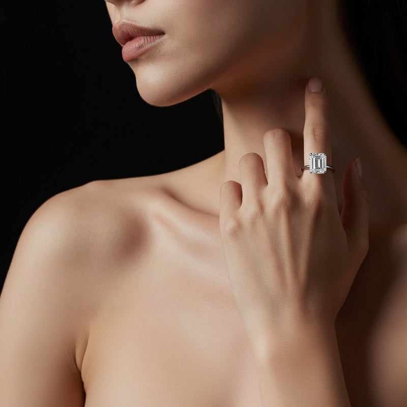 Model wearing emerald lab grown diamond classic solitaire ring