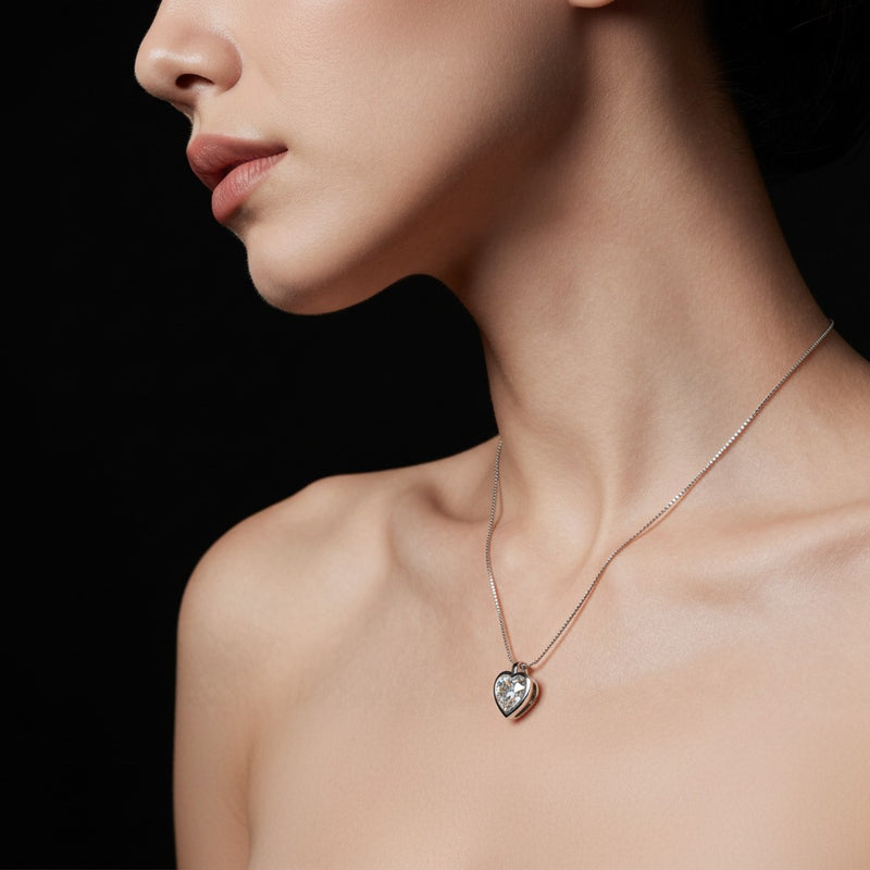 Model wearing heart bezel set solitaire pendant