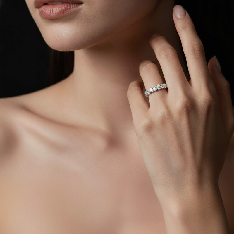 Model wearing oval lab grown diamond split prong eternity ring