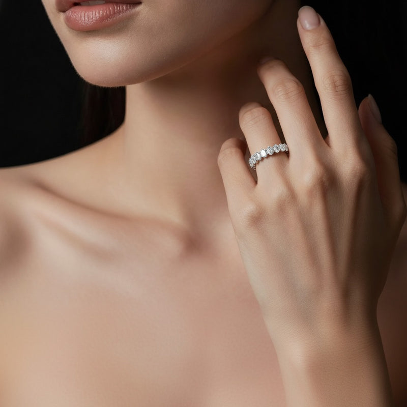 Model wearing oval lab grown diamond split prong eternity ring