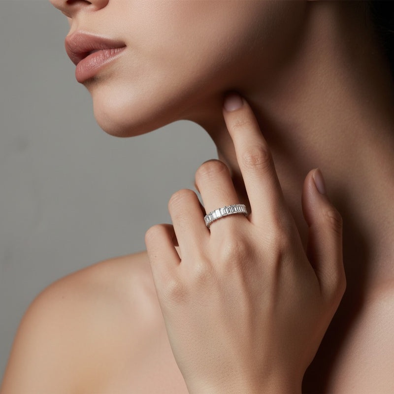 Model wearing emerald lab grown diamond split prong eternity ring