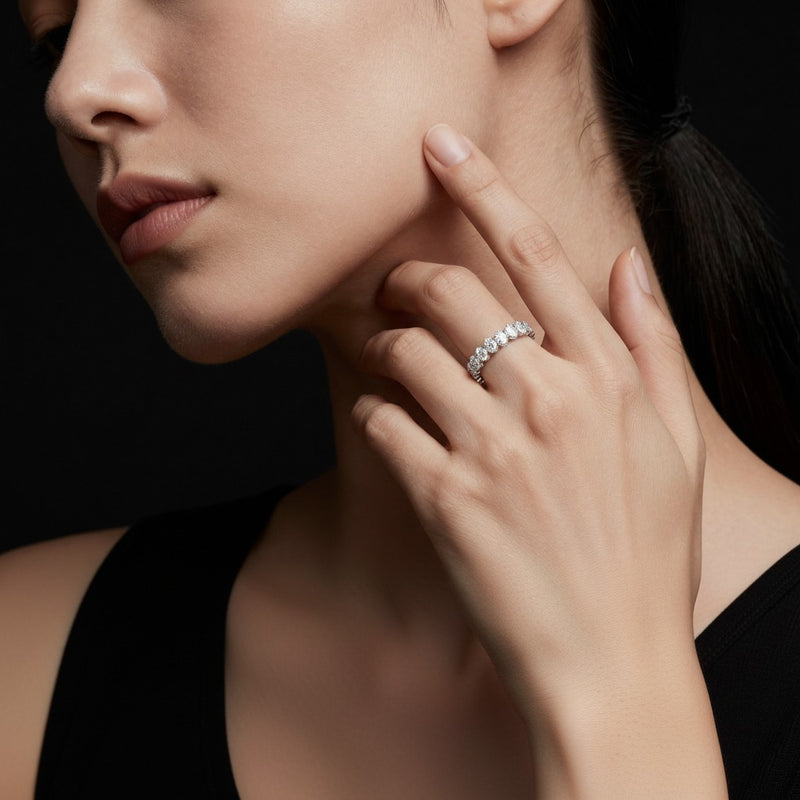Model wearing oval lab grown diamond split prong eternity ring