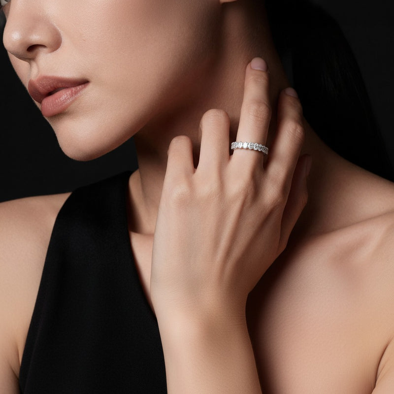 Model wearing oval lab grown diamond split prong eternity ring