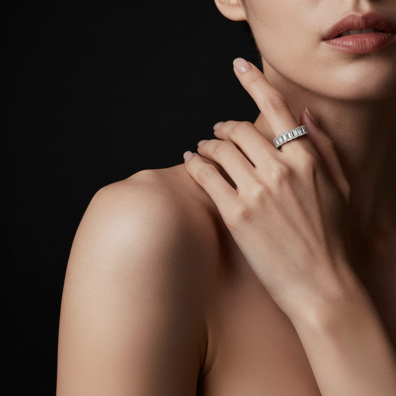 Model wearing emerald lab grown diamond split prong eternity ring