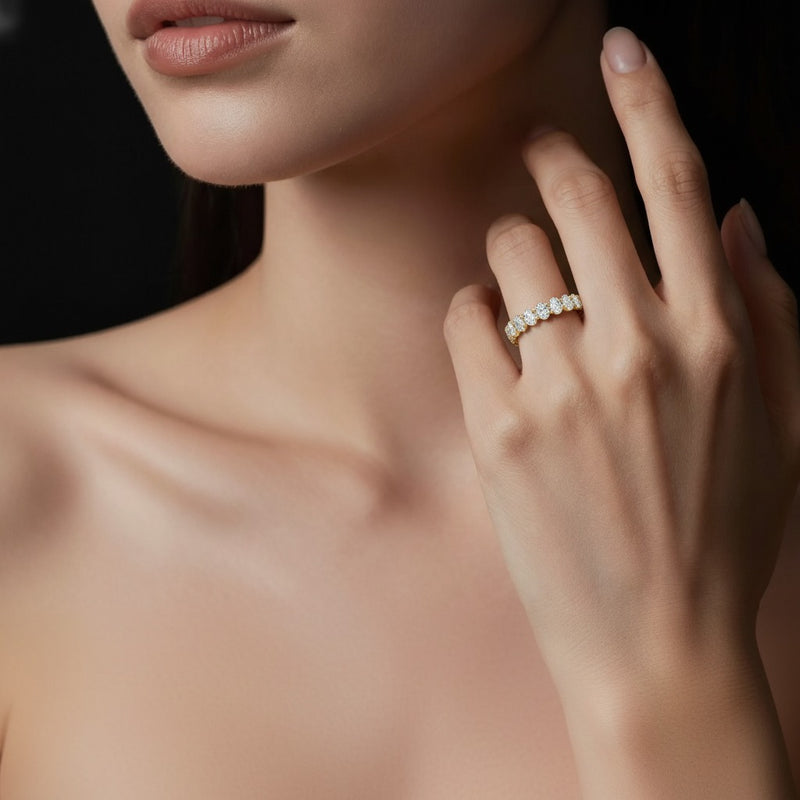 Model wearing oval lab grown diamond split prong eternity ring